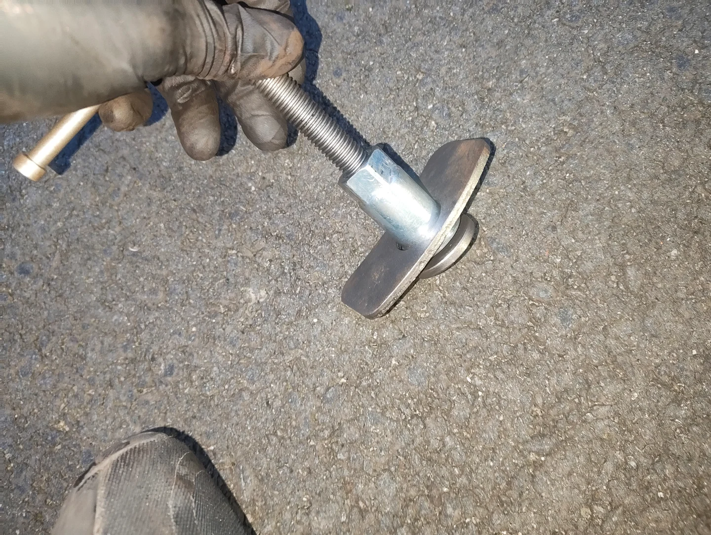 after threading part onto brake caliper retraction tool