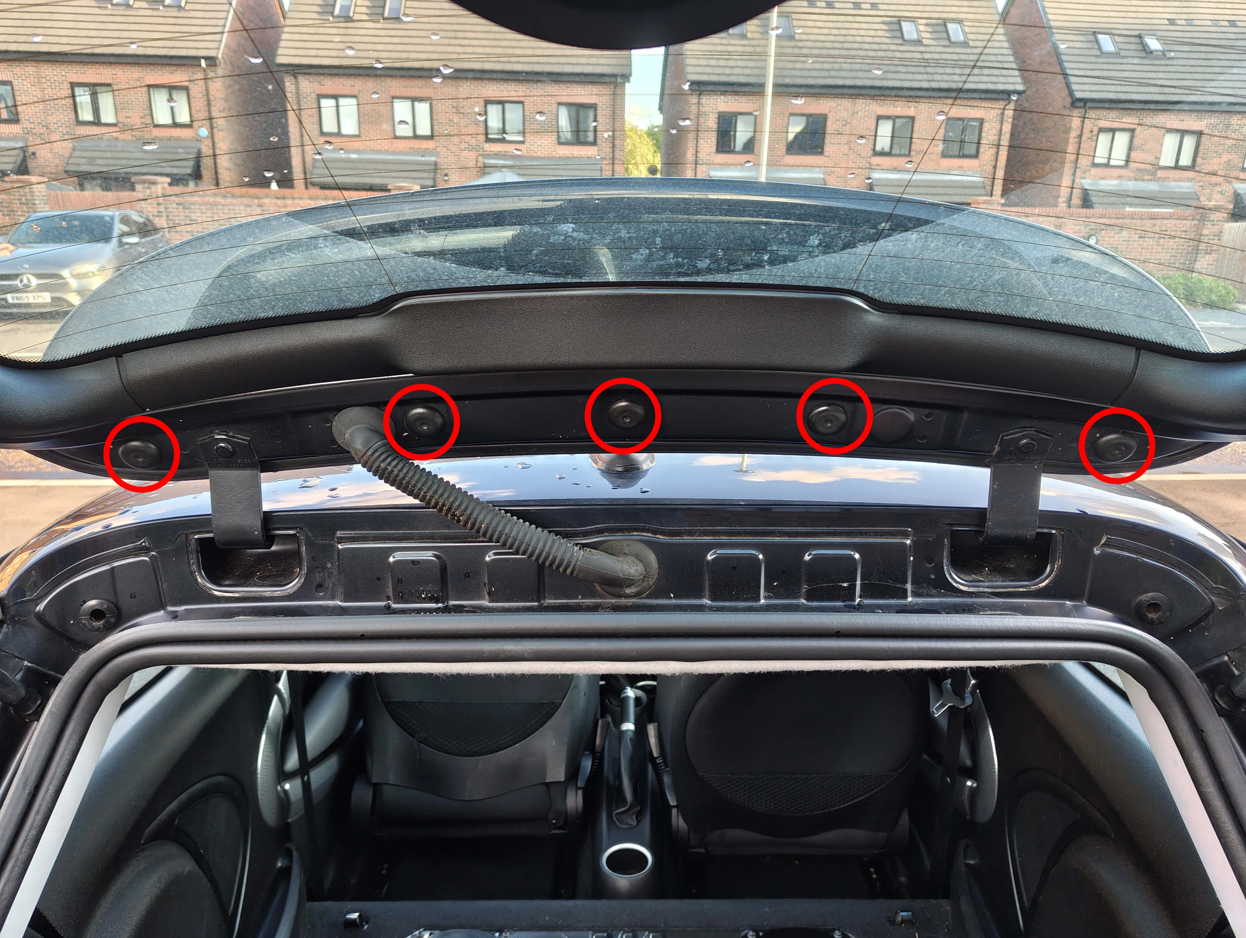 Boot open with the view of the four rubber caps