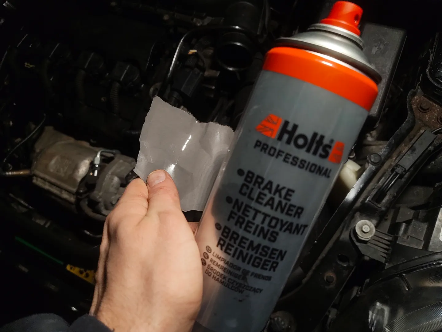 Brake cleaner and sandpaper