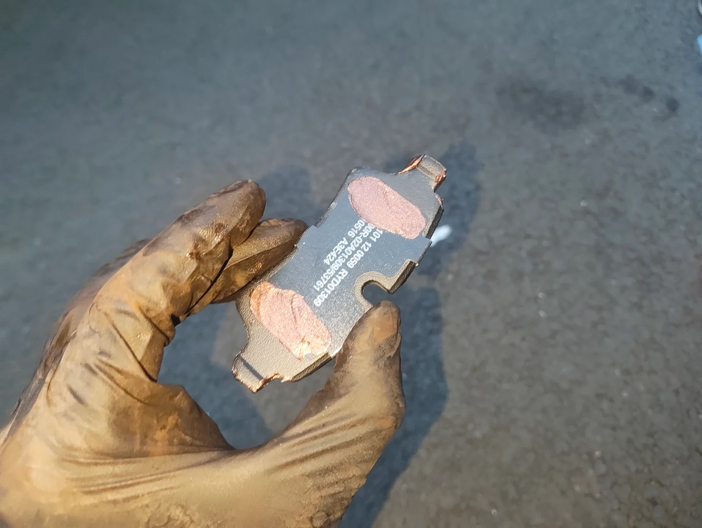 Copper grease on the outer brake pad