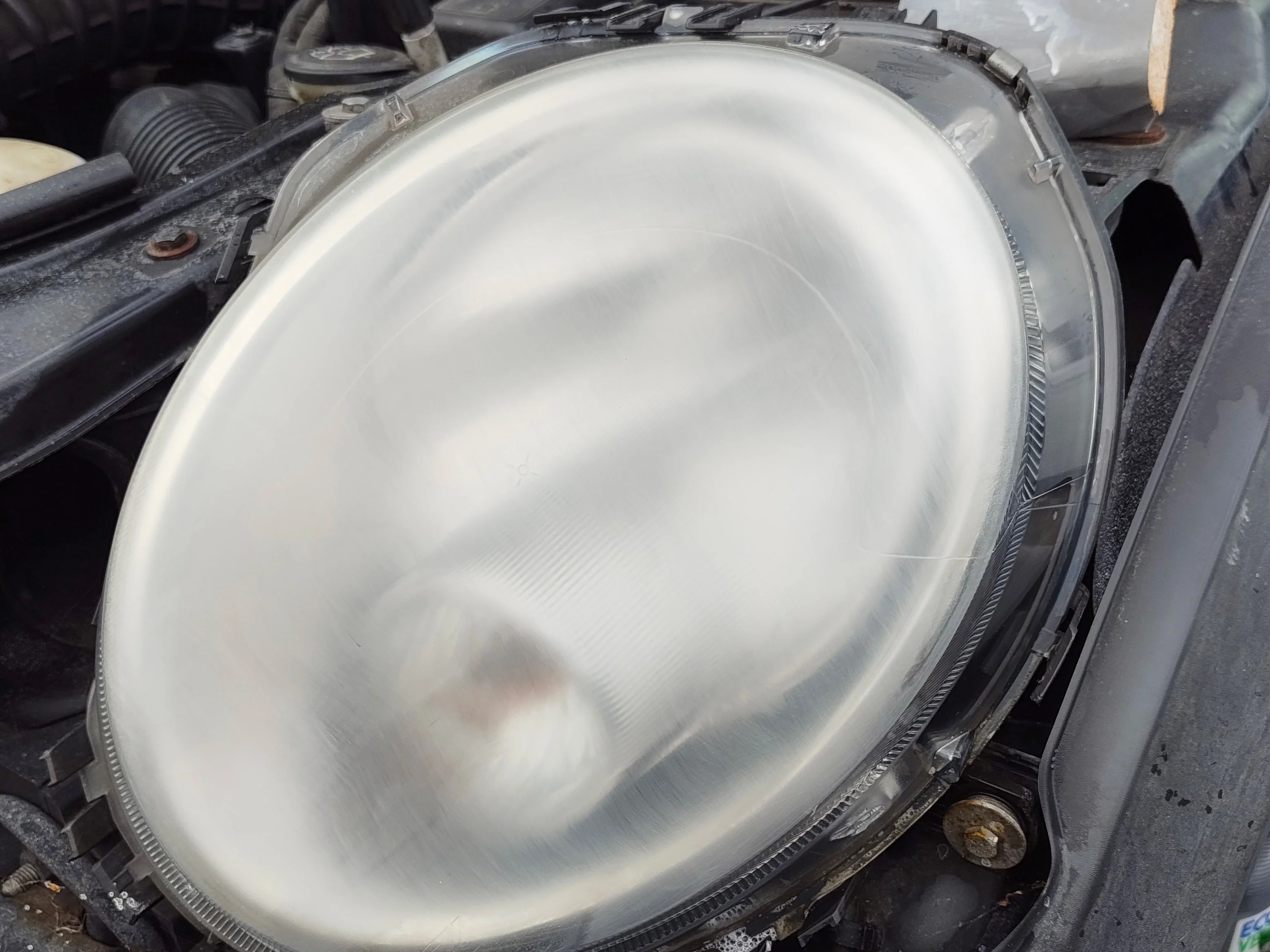 Even glaze on headlights after sanding