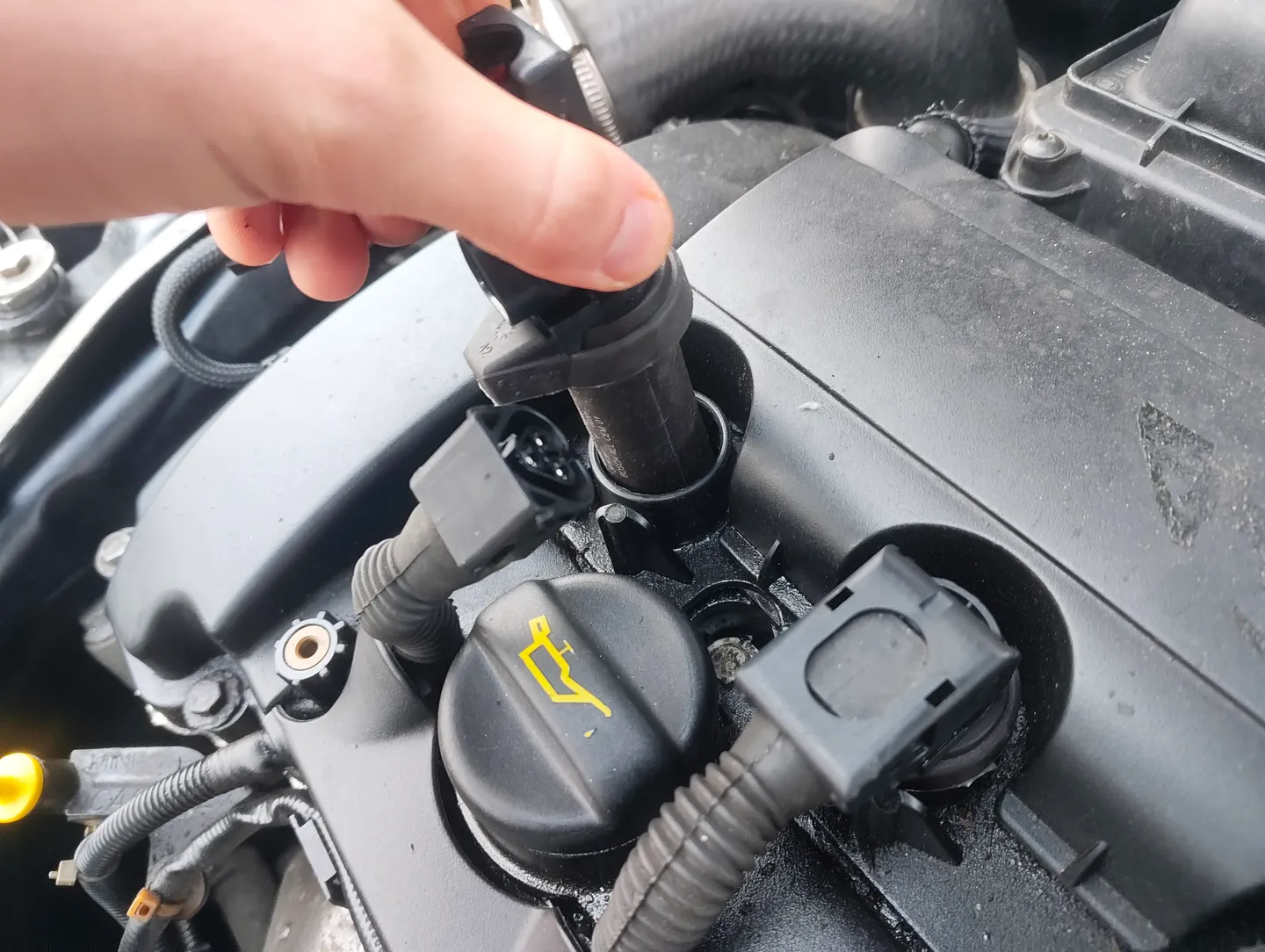 Partially removed ignition coil