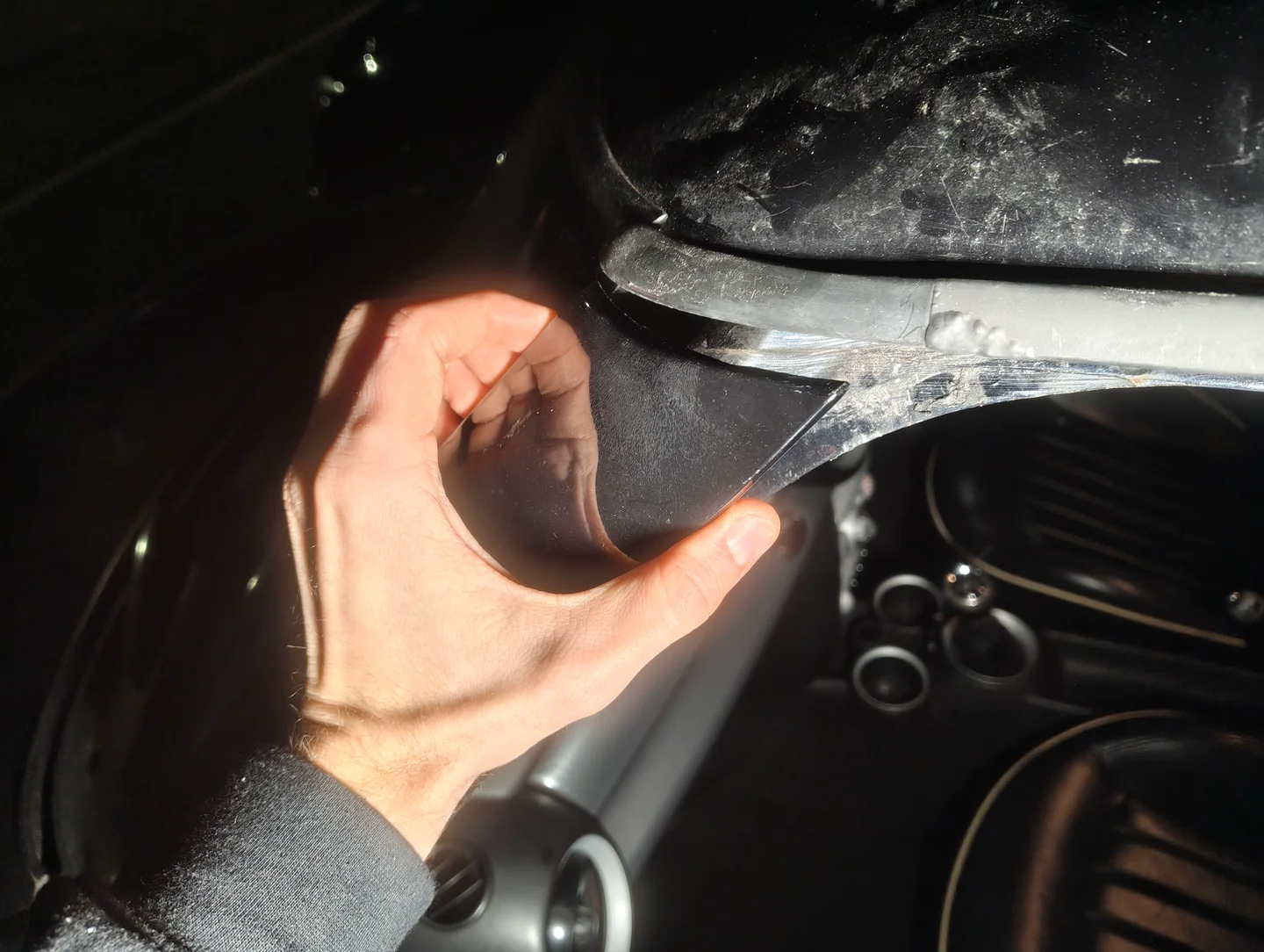 Pulling nearside A-Pillar trim