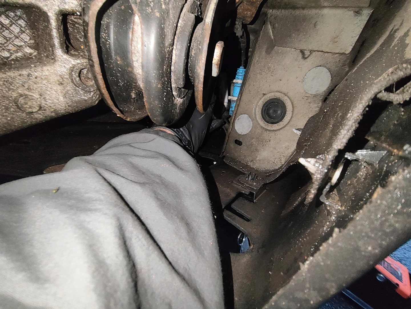 Reaching for rear pad sensor connector