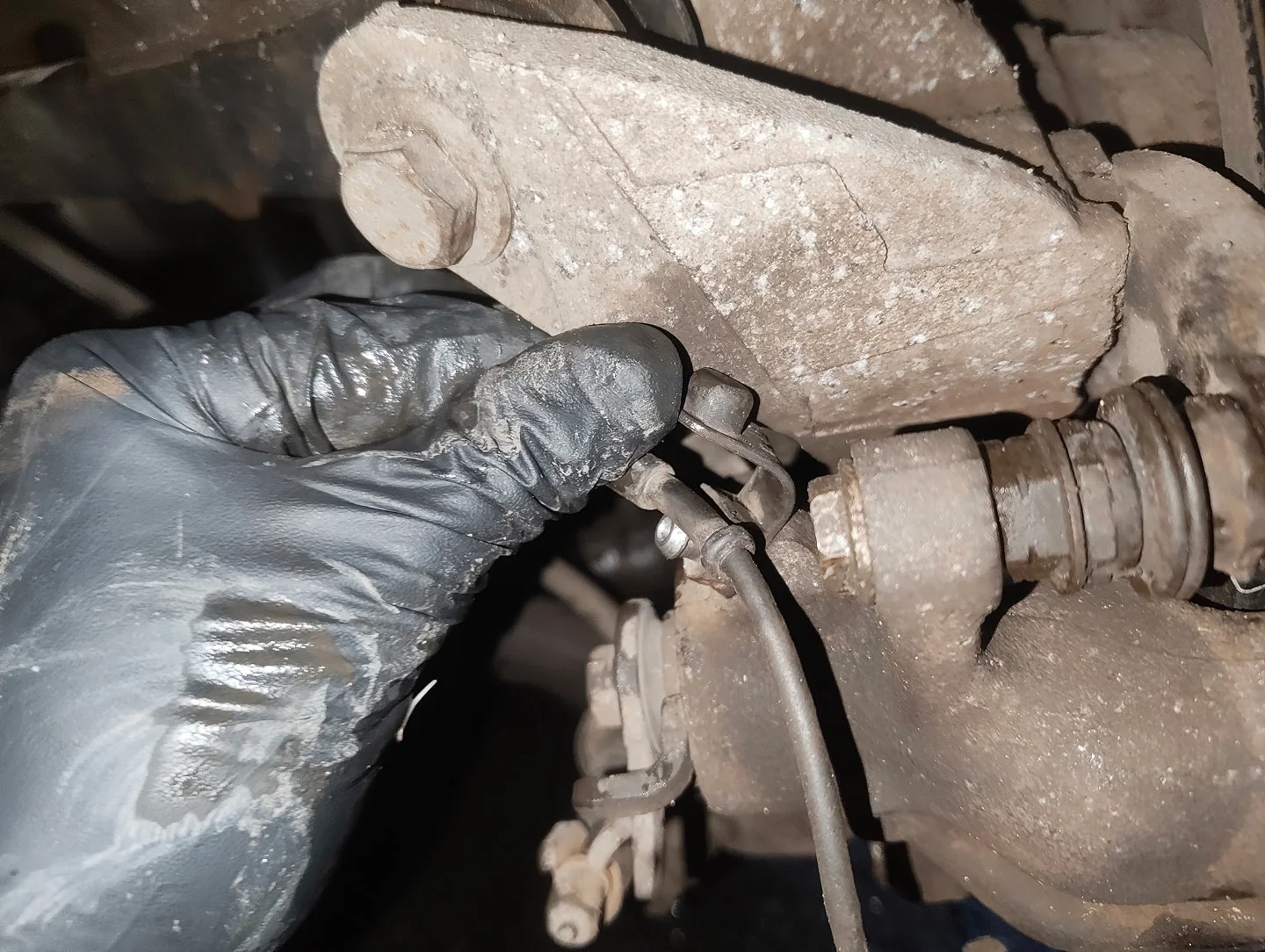 Rear brake caliper bleed screw cap undone