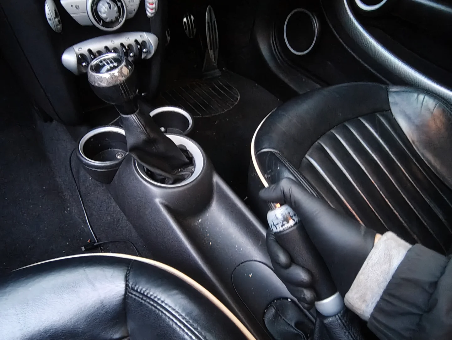 Car in reverse and releasing the handbrake