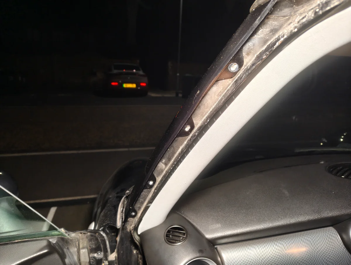 Removed nearside A-Pillar screws