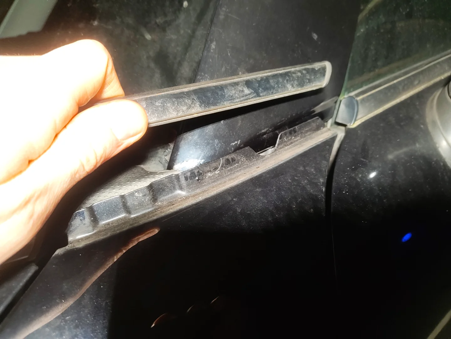 Removed nearside front wing trim