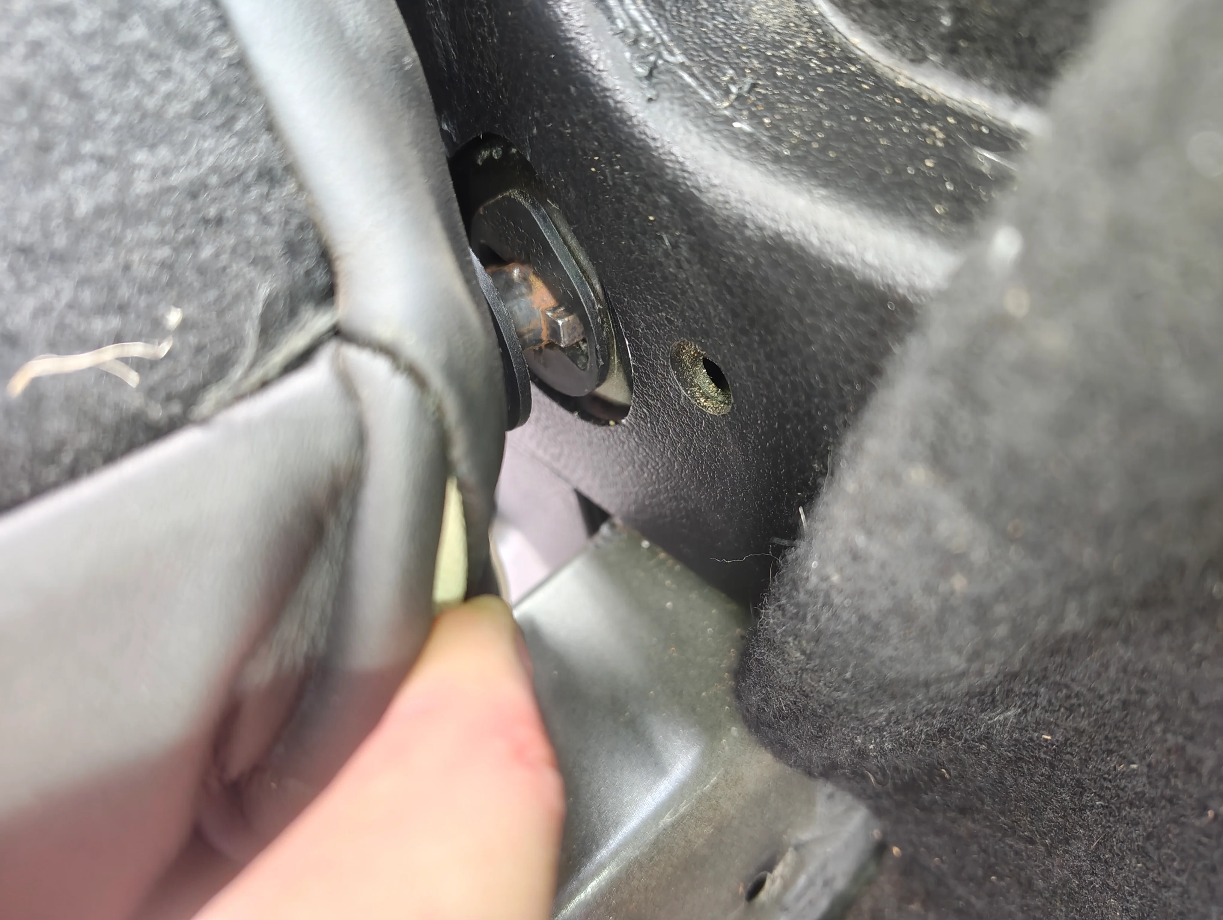 Seat back hinge partially removed