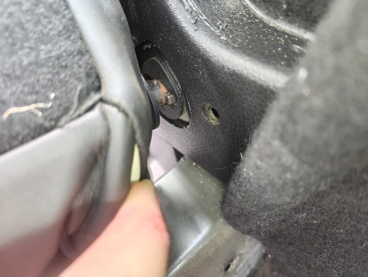 Seat back hinge partially removed