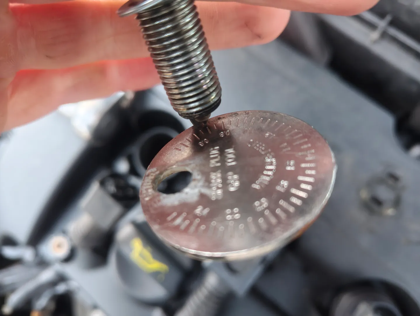 Spark plug stuck on spark plug gauge tool