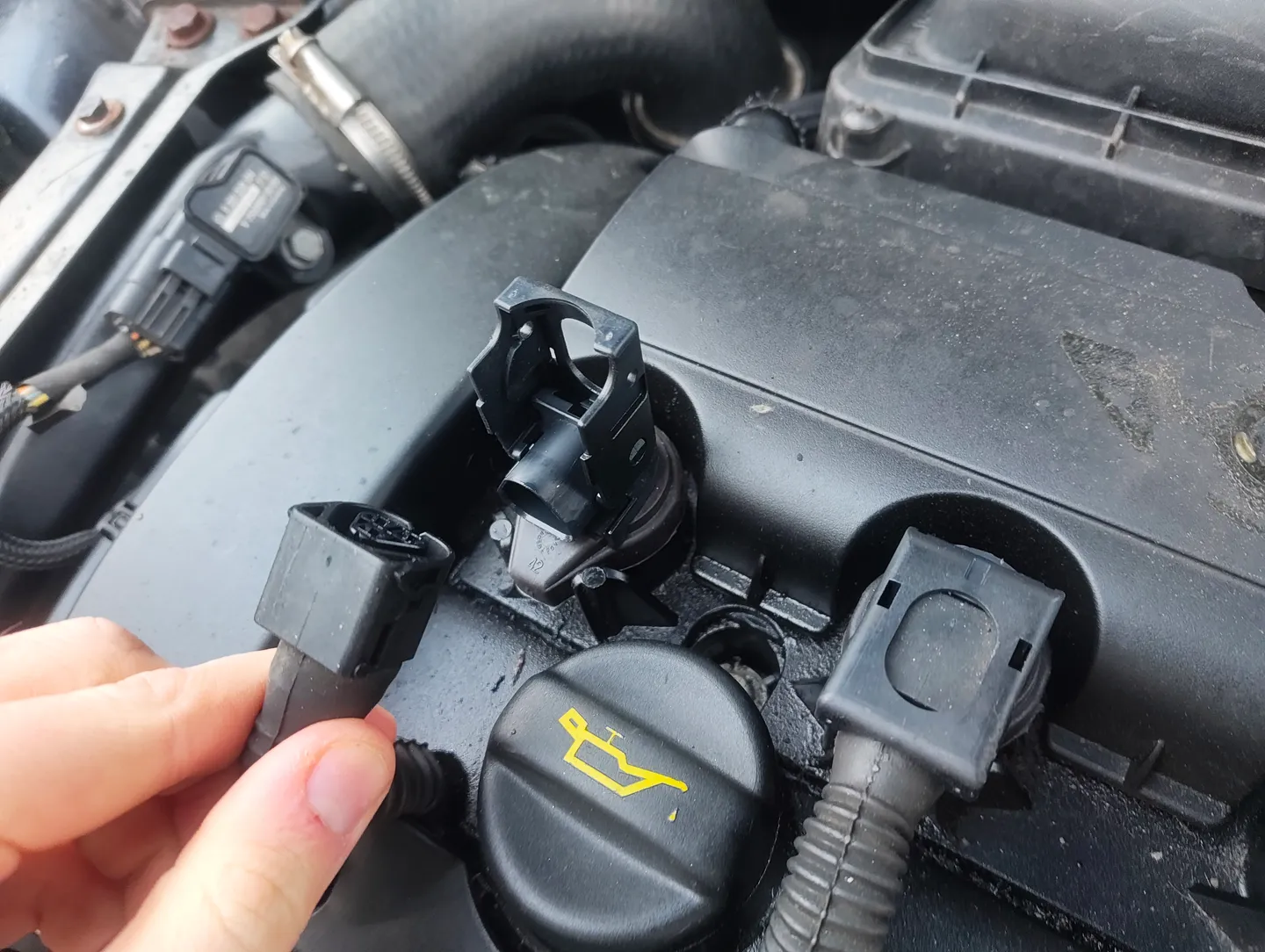 Unplugging ignition coil