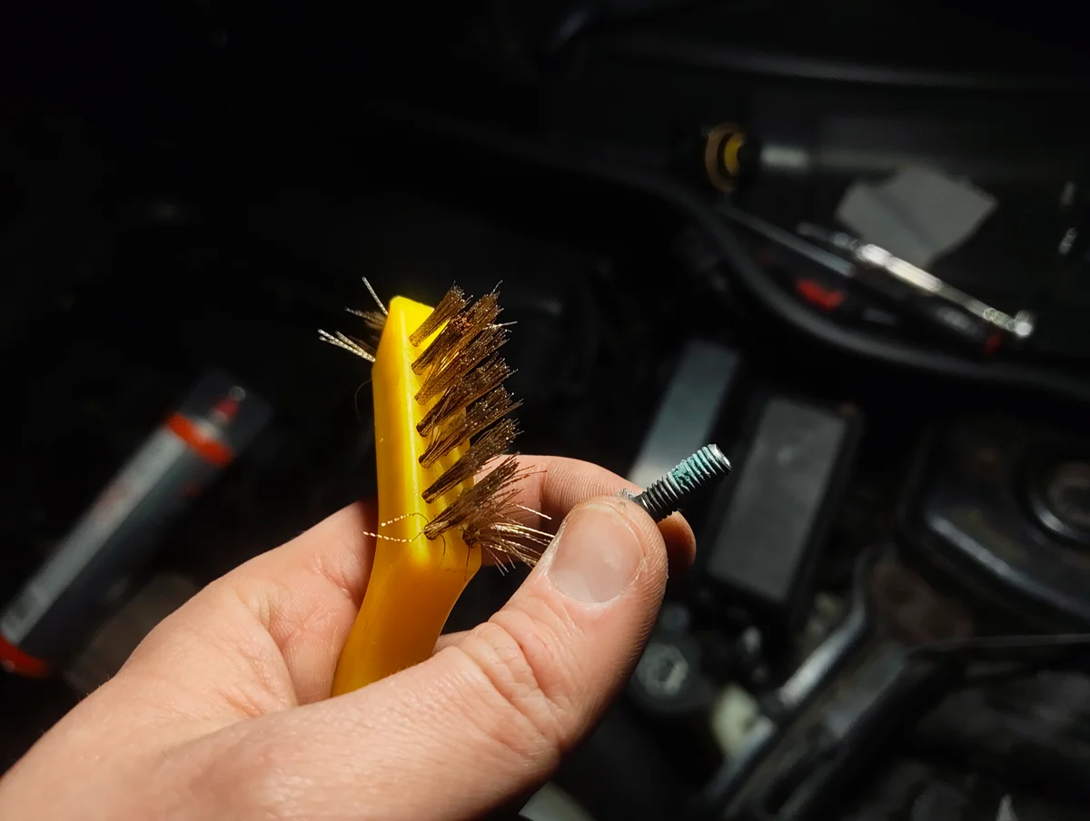 Wire brush and bolt
