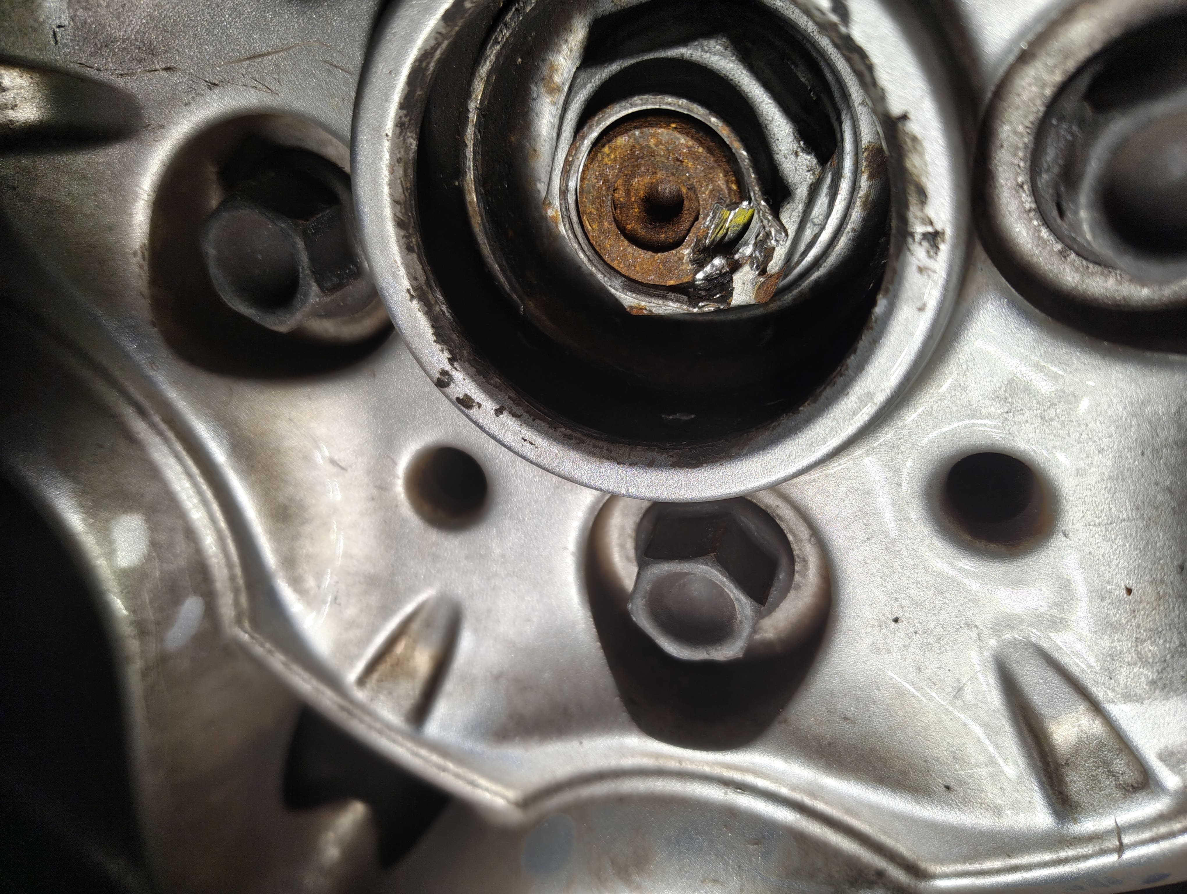 After hammering the driveshaft nut indentation with a hammer and flathead screwdriver