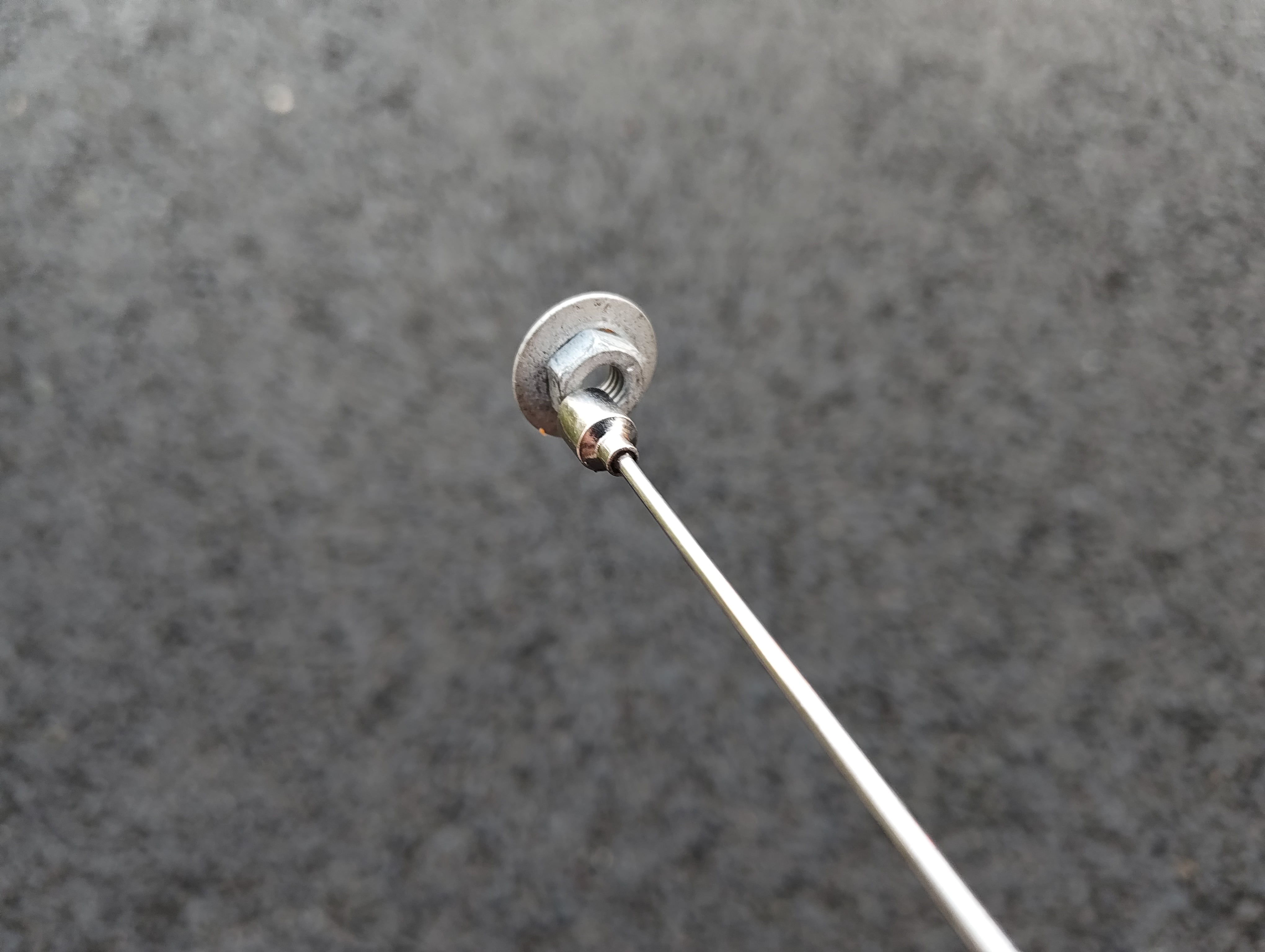 Telescopic magnet tool with nut attached